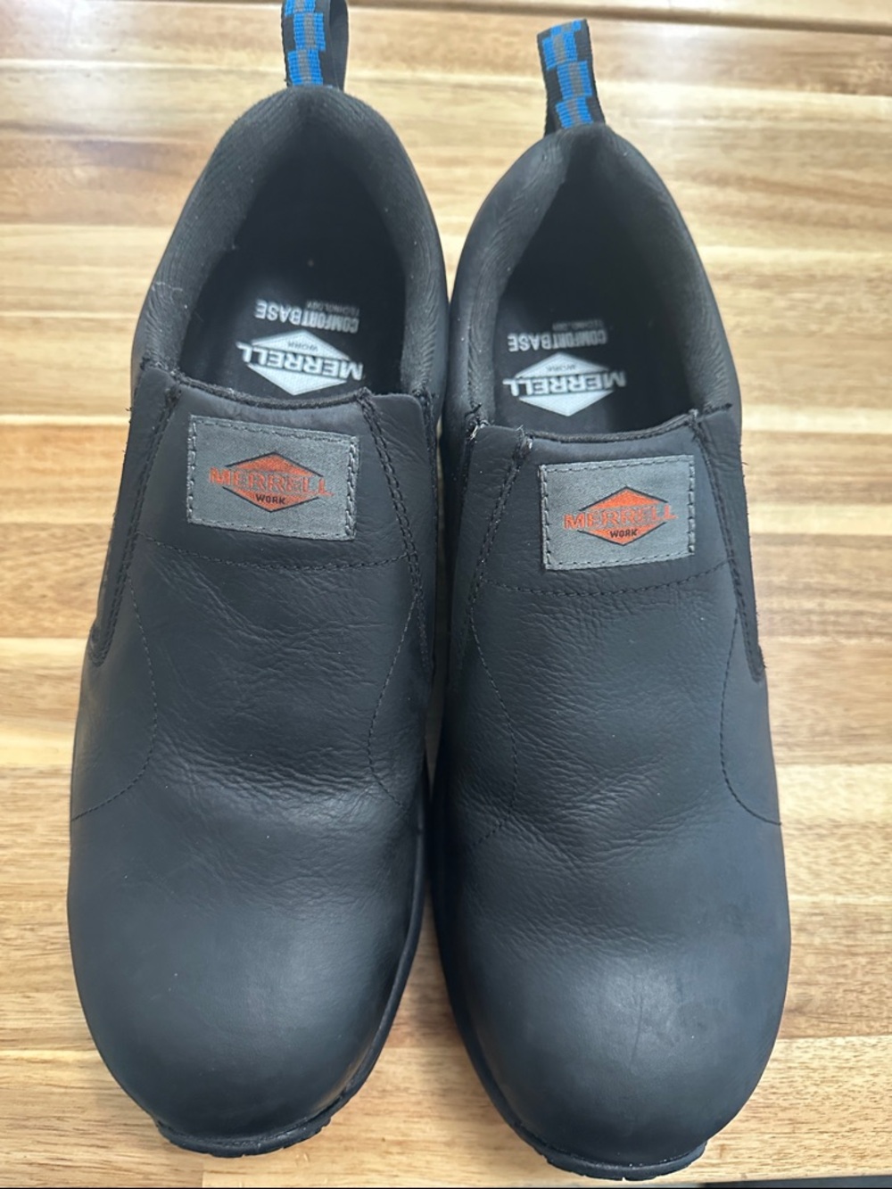Merrell Black Slip-On Work Loafers with Blue Heel Tabs